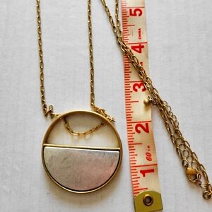 Elegant Gold and Silver Pendant Necklace